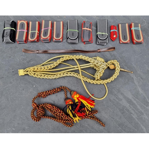 311 - A British army ceremonial gilt aiguillette cord; together with a quantity of military epaulettes.... 