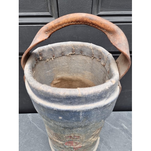 312 - A blue canvas military shot bucket, decorated Royal Cipher, with leather handle, 45cm high.... 