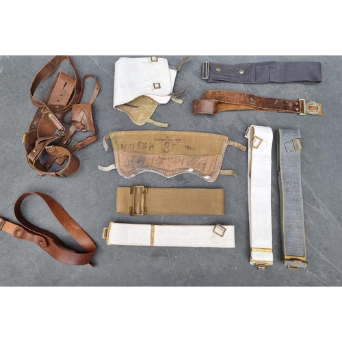 317 - A vintage British military Sam Brown belt, with shoulder strap, whistle and sword frog; together wit... 