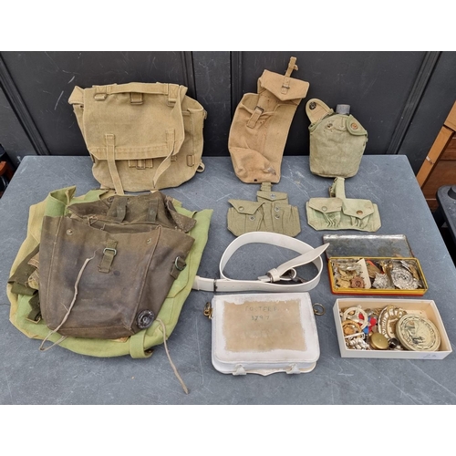 328 - A carton of various British military webbing.