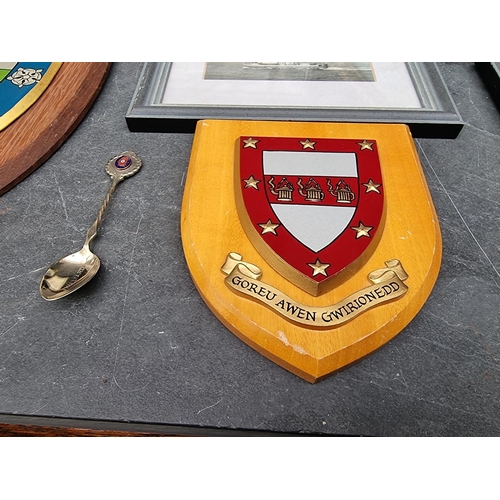 332 - A carton of Royal Navy ephemera and a plaque.