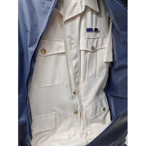 333 - A Royal Navy tropical dress uniform and mess jacket.