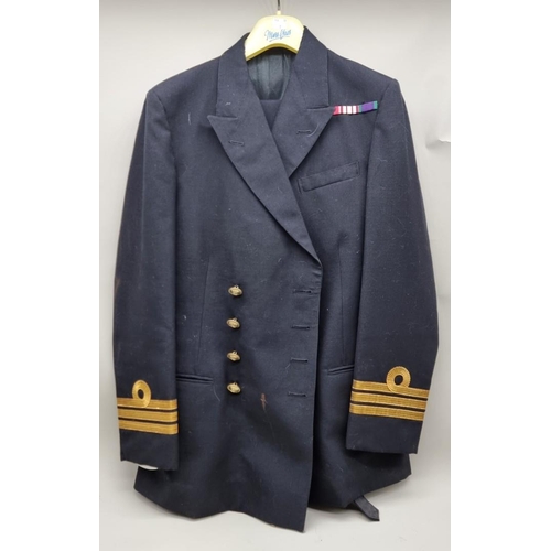 334 - A Royal Navy Commander's uniform, with sword belt.