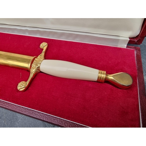 54 - A cased Wilkinson Sword 1972 bicentennial presentation dagger and sheath, the 27.5cm blade etched, t... 