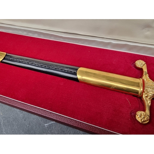 54 - A cased Wilkinson Sword 1972 bicentennial presentation dagger and sheath, the 27.5cm blade etched, t... 