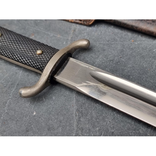 63 - A German K98 dress bayonet and scabbard, having 25cm blade.