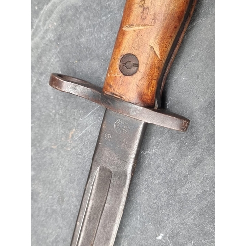 66 - A WWI 1913 pattern Remington bayonet, the 43cm blade stamped '11-16'.