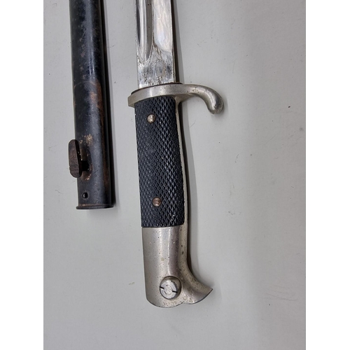 68 - A German WWII parade bayonet and scabbard, by E F Horster Solingen, with 24.5cm blade.... 