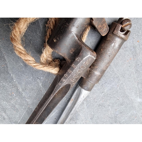 76 - A vintage Russian bayonet; together with a vintage Chinese bayonet. (2)