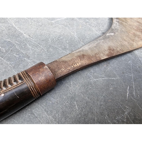 82 - An Indonesian Java Golok machete, having carved horn handle with 19cm blade.