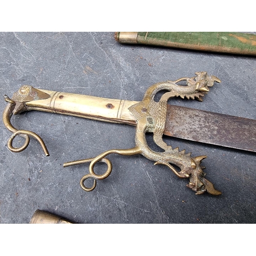 83 - Two Eastern daggers and sheaths, possibly Indian, with 34.5cm and 35.5cm blades respectively, each w... 