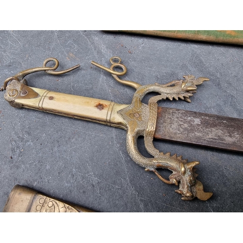 83 - Two Eastern daggers and sheaths, possibly Indian, with 34.5cm and 35.5cm blades respectively, each w... 