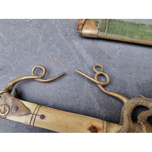 83 - Two Eastern daggers and sheaths, possibly Indian, with 34.5cm and 35.5cm blades respectively, each w... 