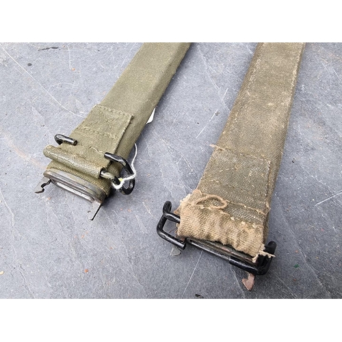 85 - Two canvas and leather covered bayonet scabbards, M1909?, each approximately 45cm long.... 