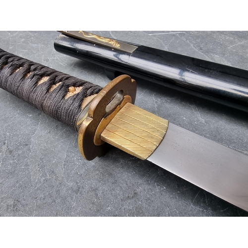 91 - A Japanese sword and scabbard, having 55cm blade.