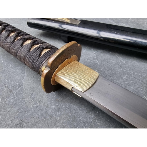 91 - A Japanese sword and scabbard, having 55cm blade.