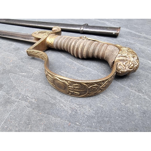 98 - A German Imperial officer's lionhead sabre and steel scabbard, having 76cm fullered blade.... 