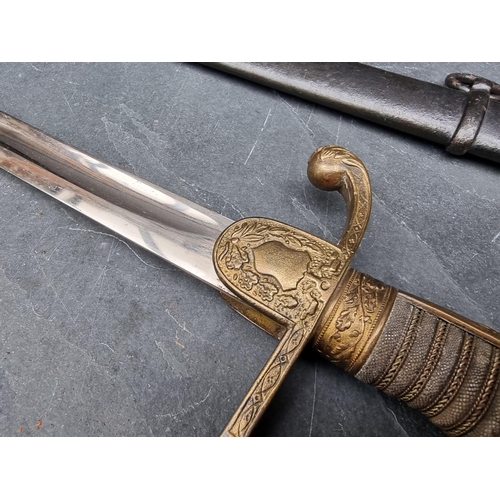 98 - A German Imperial officer's lionhead sabre and steel scabbard, having 76cm fullered blade.... 