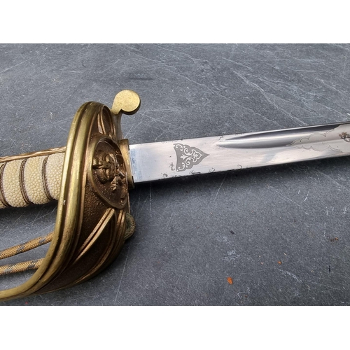 99 - A George VI 1827 pattern Royal Navy officer's sword and scabbard, with 80cm etched blade.... 