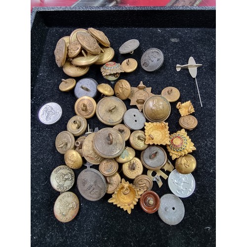 234 - Two RAF brass cap badges, 44mm high; together with a WW1 British Volunteer War Workers Badge, by J.R... 