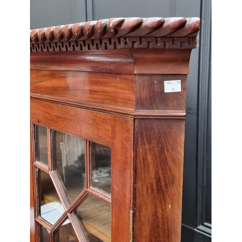 1016 - An old mahogany standing corner cupboard, 98cm wide.