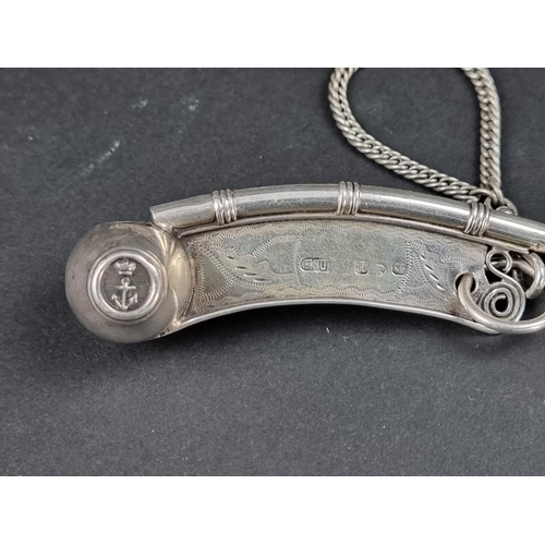 306 - A silver bosun's whistle, by George Unite, Birmingham 1957, 10.5cm long, on a white metal lanyard, g... 