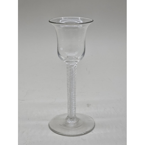 1248 - An 18th century combined twist stem wine glass, 15.5cm high.