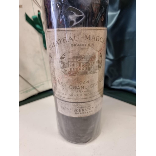 90 - A bottle of Chateau Margaux, 1944, in presentation box, with certification and The Times, September ... 