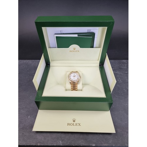 634 - A circa 2006 Rolex 18ct gold 'Oyster Perpetual Day Date' wristwatch, on 18ct gold 'President' bracel... 