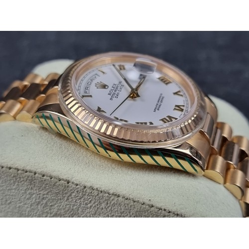 634 - A circa 2006 Rolex 18ct gold 'Oyster Perpetual Day Date' wristwatch, on 18ct gold 'President' bracel... 