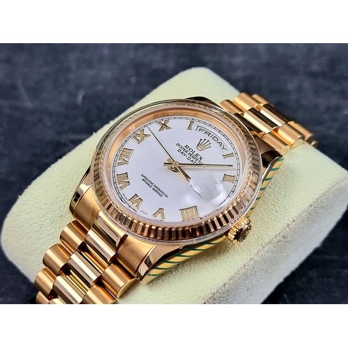 634 - A circa 2006 Rolex 18ct gold 'Oyster Perpetual Day Date' wristwatch, on 18ct gold 'President' bracel... 