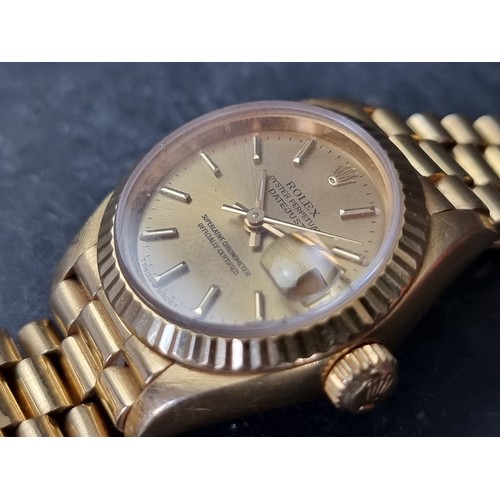 636 - A Rolex 'Oyster Perpetual Datejust' 18ct gold ladies wristwatch, 25mm, Ref. 69178, on original 18ct ... 