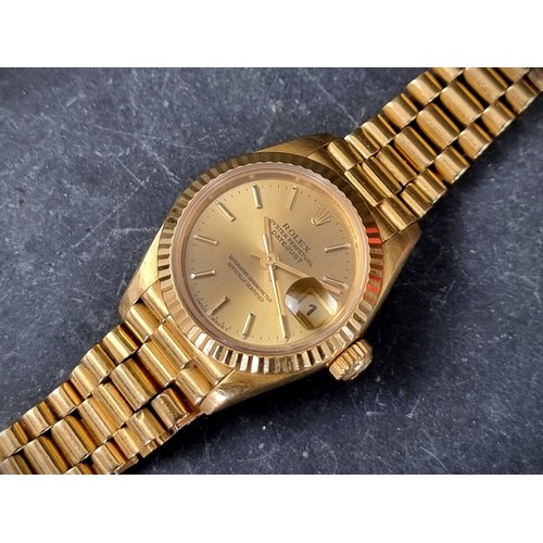 636 - A Rolex 'Oyster Perpetual Datejust' 18ct gold ladies wristwatch, 25mm, Ref. 69178, on original 18ct ... 