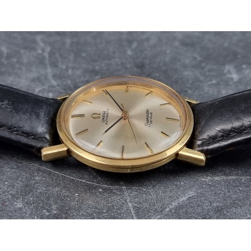 643 - A circa early 1960s Omega 'Seamaster De Ville' 18ct gold automatic wristwatch, 31mm, on later black ... 