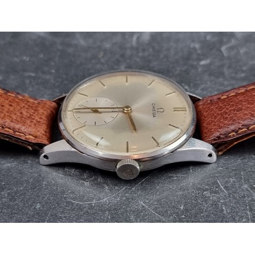 645 - A circa 1954 Omega stainless steel manual wind wristwatch, 35mm, Ref. 14387934, Cal. 266, on later b... 