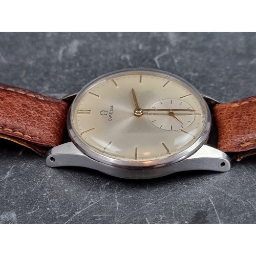 645 - A circa 1954 Omega stainless steel manual wind wristwatch, 35mm, Ref. 14387934, Cal. 266, on later b... 