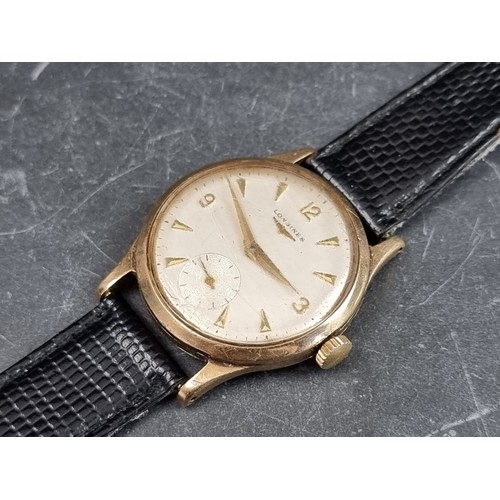 653 - A circa 1966 Longines 9ct gold manual wind wristwatch, 33mm, Ref. 12908386, on black lizard strap.... 