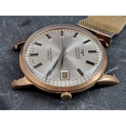 657 - A Technos 9ct gold automatic wristwatch, 34mm, Ref. 3003, import mark Edinburgh 1965, with later gol... 