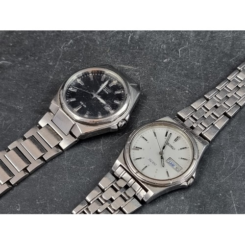 675 - A Seiko stainless steel quartz wristwatch, 35mm, Ref. 7N43-8200, together with a Citizen 'Eco-Drive'... 