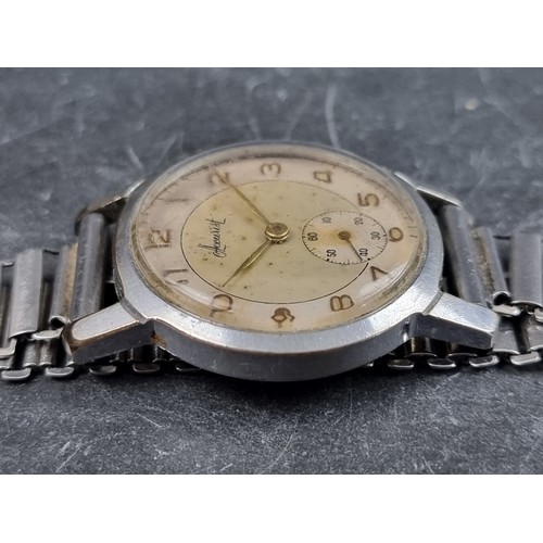 696 - A circa 1950s Accurist stainless steel manual wind wristwatch, 32mm, on stainless steel bracelet.... 