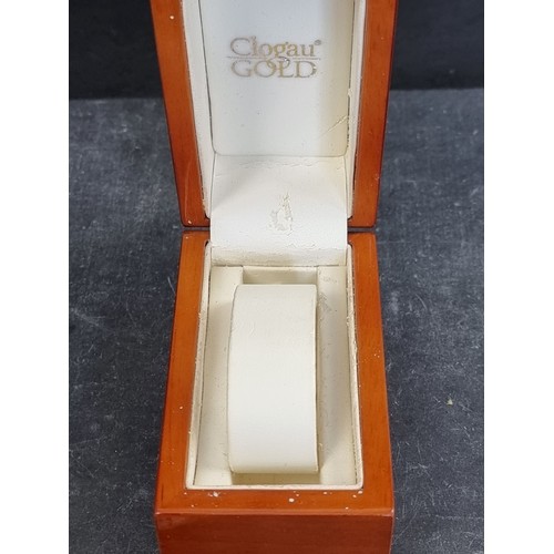 705 - A Clogau 9ct gold quartz ladies wristwatch, 11mm, on original leather strap, boxed.