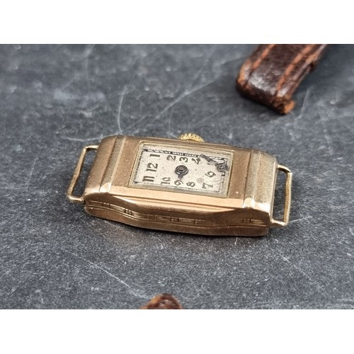 710 - A circa 1930s 9ct gold manual wind ladies wristwatch, 14mm, with brown leather strap.... 