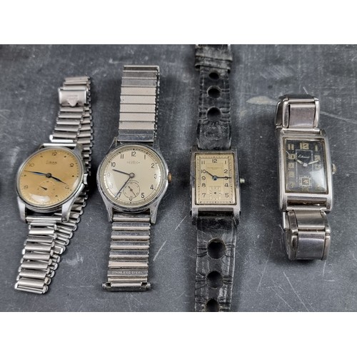 712 - A group of wristwatches, to include examples by Oris and Girard Perregaux. (8)