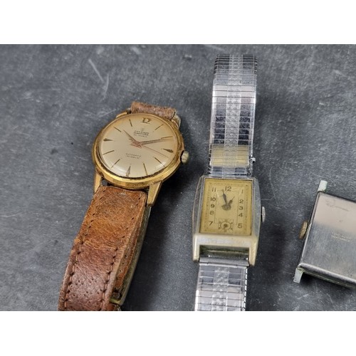 712 - A group of wristwatches, to include examples by Oris and Girard Perregaux. (8)