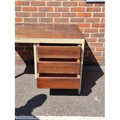 1007 - A vintage industrial painted metal and stained pine desk and matching plan chest, each 120cm wide.... 