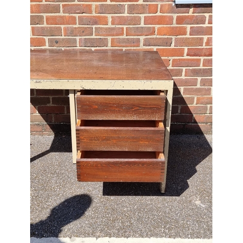 1007 - A vintage industrial painted metal and stained pine desk and matching plan chest, each 120cm wide.... 