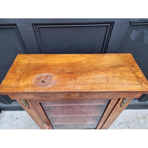 1008 - A Victorian walnut and inlaid pier cabinet, 76cm wide.