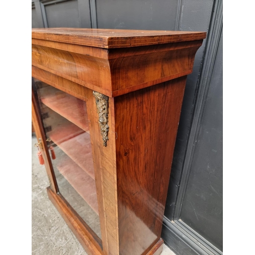 1008 - A Victorian walnut and inlaid pier cabinet, 76cm wide.