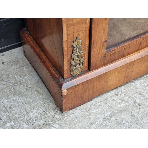 1008 - A Victorian walnut and inlaid pier cabinet, 76cm wide.