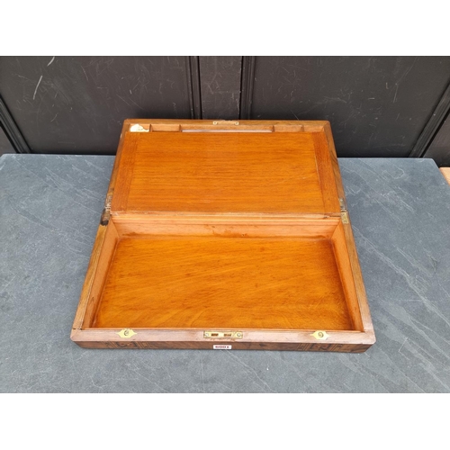 1009 - A Victorian figured walnut and parquetry writing slope, 50cm wide.